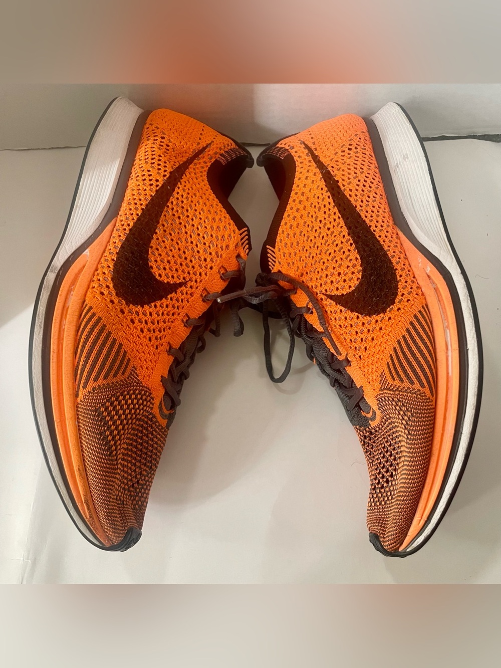 Nike Men’s Bright Orange Flyknit Running Shoes with Black Swoosh size 11